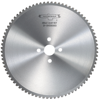 Close-up of a cermet saw blade with fine tooth design and center bore holes